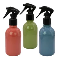 Botellas rociadoras de colores con atomizador de gatillo negro, ideales como material promocional para productos de cuidado personal y del hogar