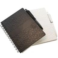 Toma fotográfica de libreta troya promocional, ideal para personalización de marca.