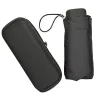 Paraguas plegable compacto en color negro con estuche rígido con cierre, práctico dentro de los utensilios para acampar y actividades al aire libre